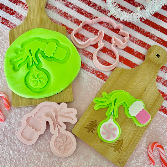 GRINCH HOLDING BAUBLE - MULTI POP EMBOSSER AND CUTTER